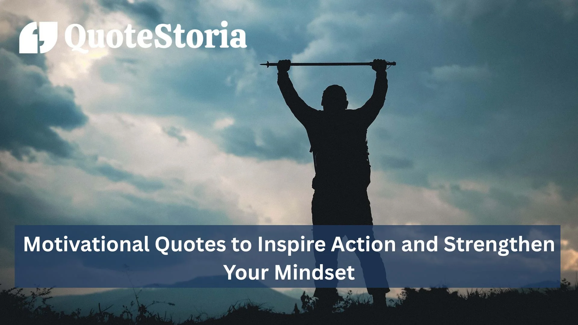 A man standing triumphantly on a mountaintop with arms raised toward a cloudy sky, symbolizing strength, victory, and the spirit of motivational quotes.