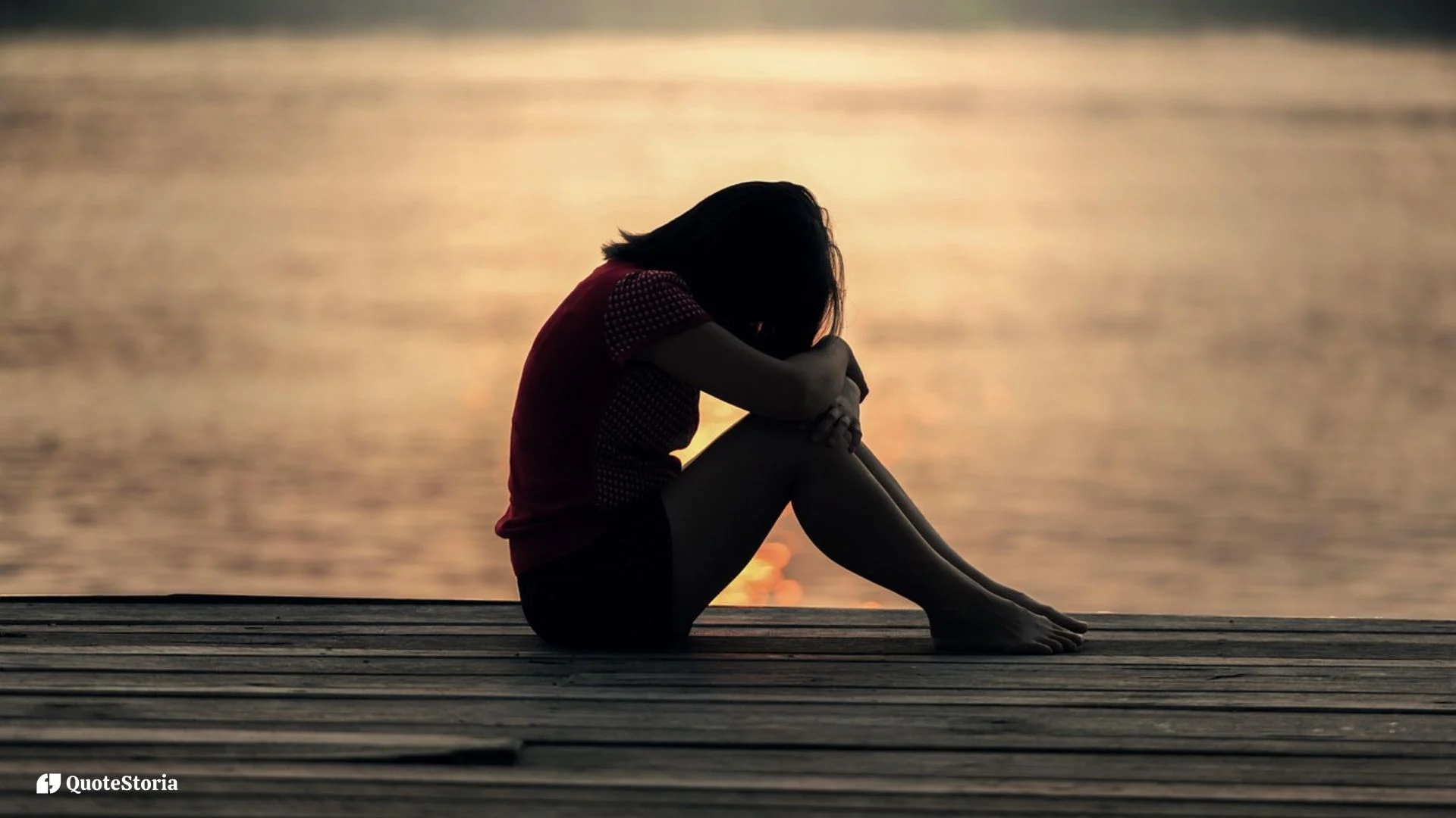 "Woman breaking through shadow toward sunrise symbolizing breakthrough."