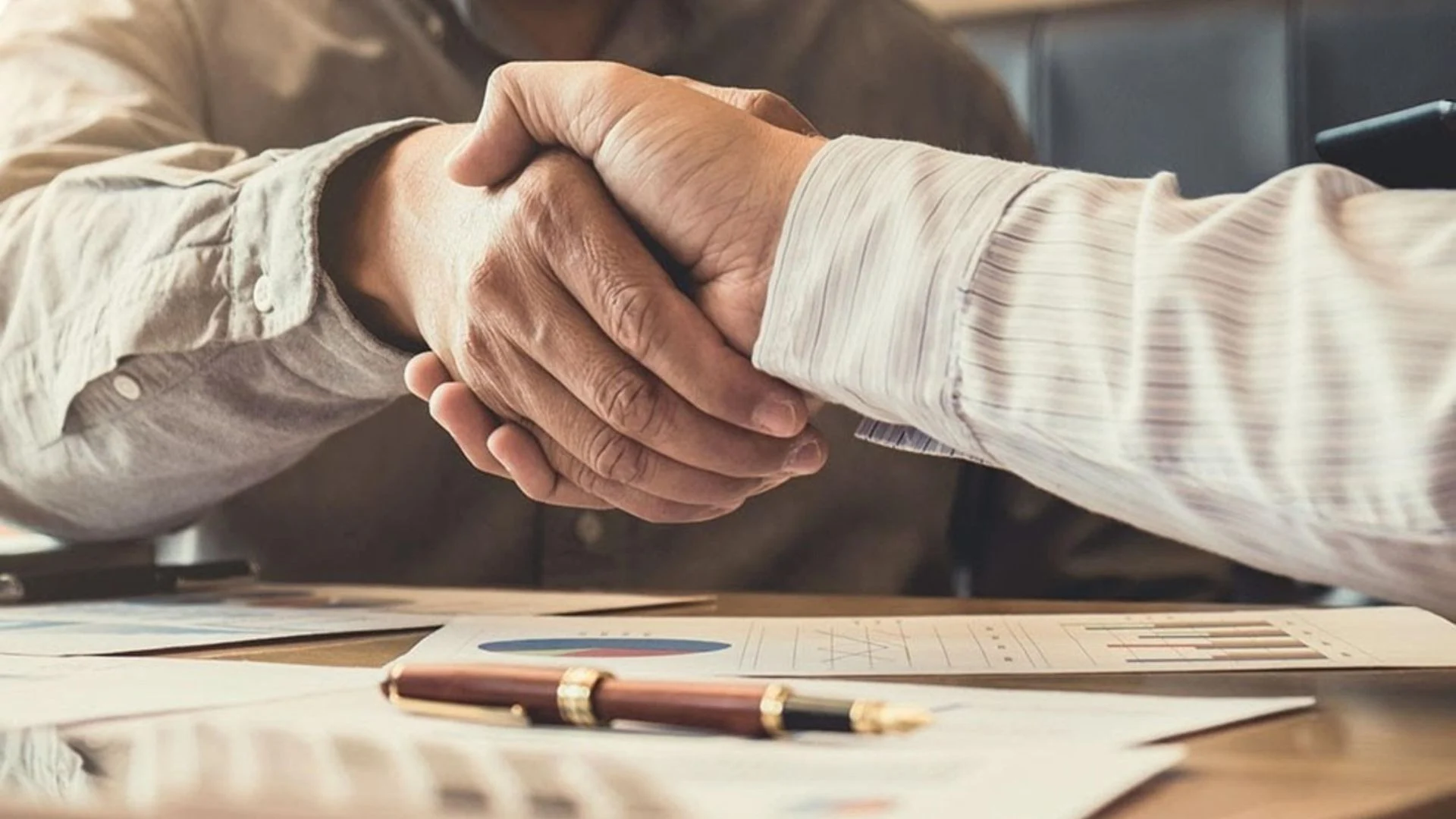 Cinematic image of a legal contract with a weaponized shadow, illustrating Buffett’s lesson on trust.